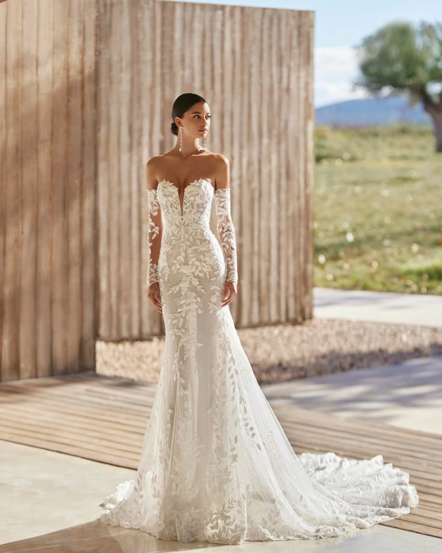 woman outdoors in lace fitted wedding dress